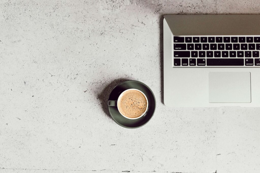 laptop and a cup of coffee